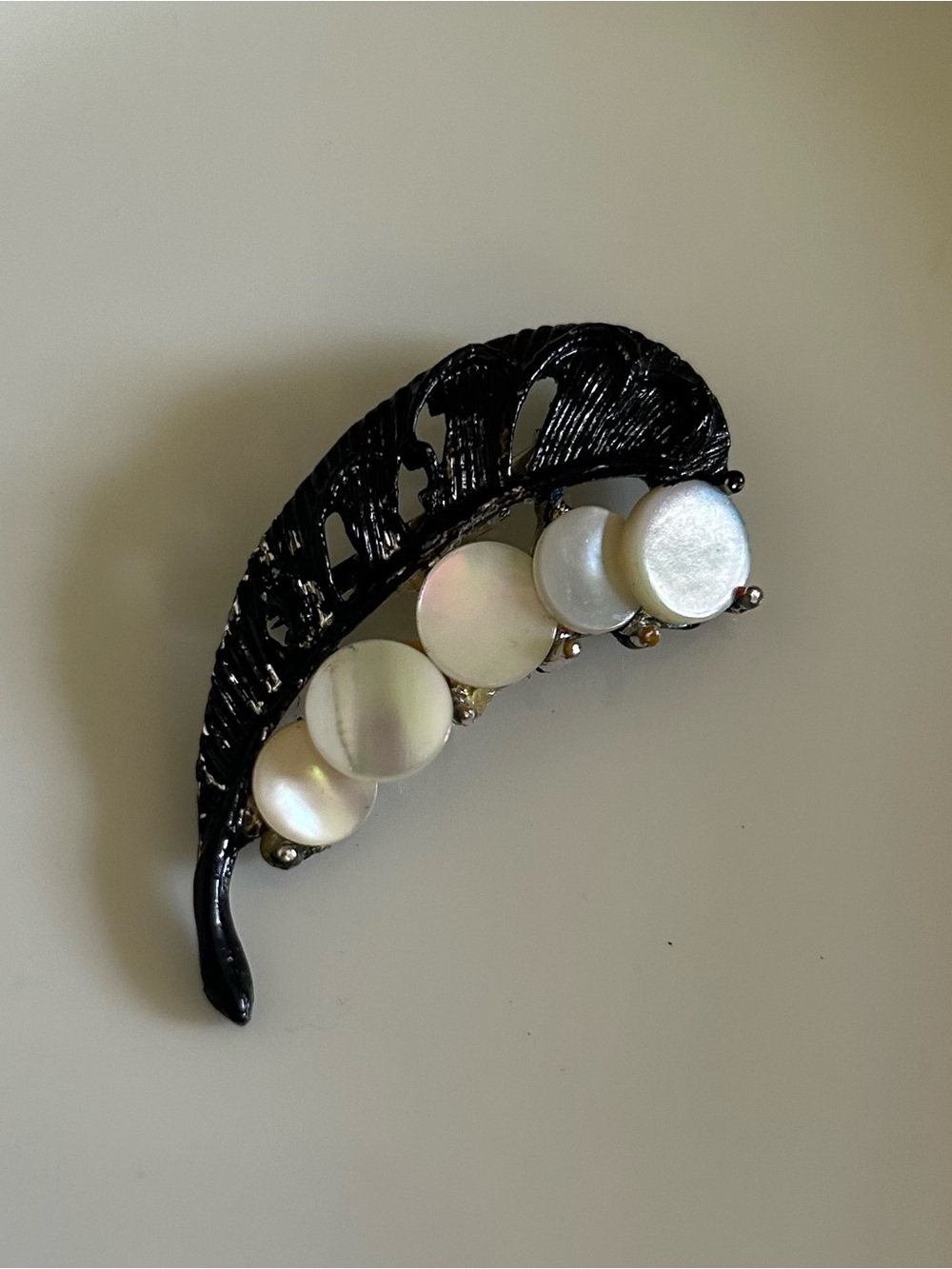 Black Painted MetalLeaf Pin with Iridescent Mother-of-Pearl Discs